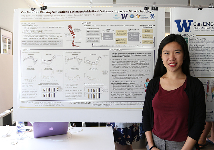 Wing-Sum Law showing her research project poster